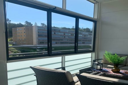 Inglasad balkong från Balco, marknadsledande för öppna och inglasade balkonger. Greåkerdalen I Borettslag